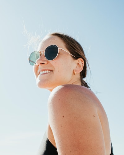 Women wearing silver box aviator sunglasses
